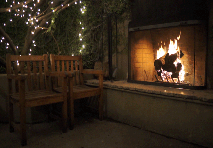 Just a pretty picture of an outside fireplace, crackling.